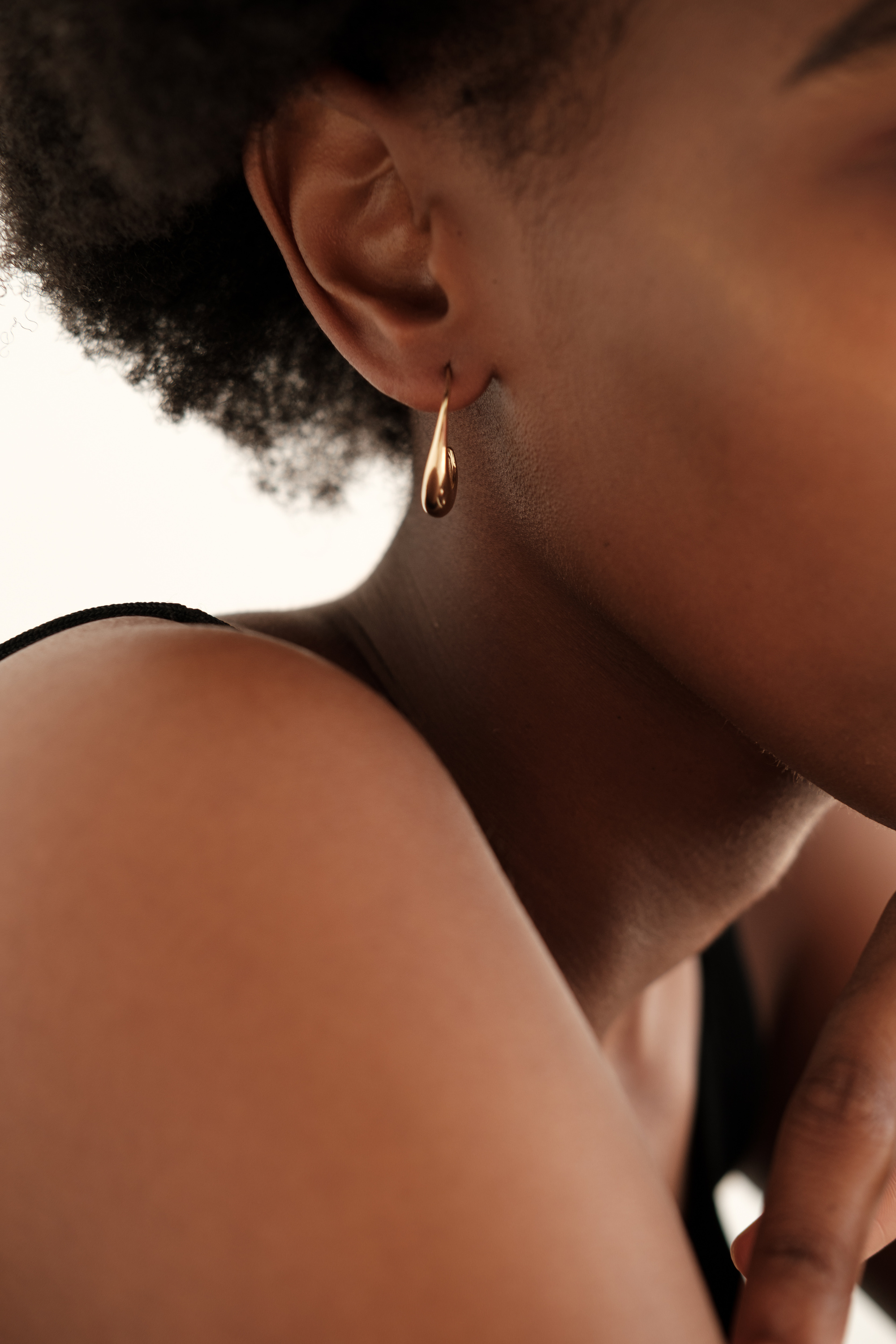 Woman with Minimalist Earrings